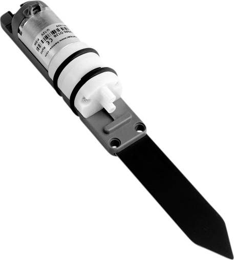 Un capteur d'humidité noir et blanc avec une zone de mesure rectangulaire et une poignée cylindrique pour les mesures de sol.