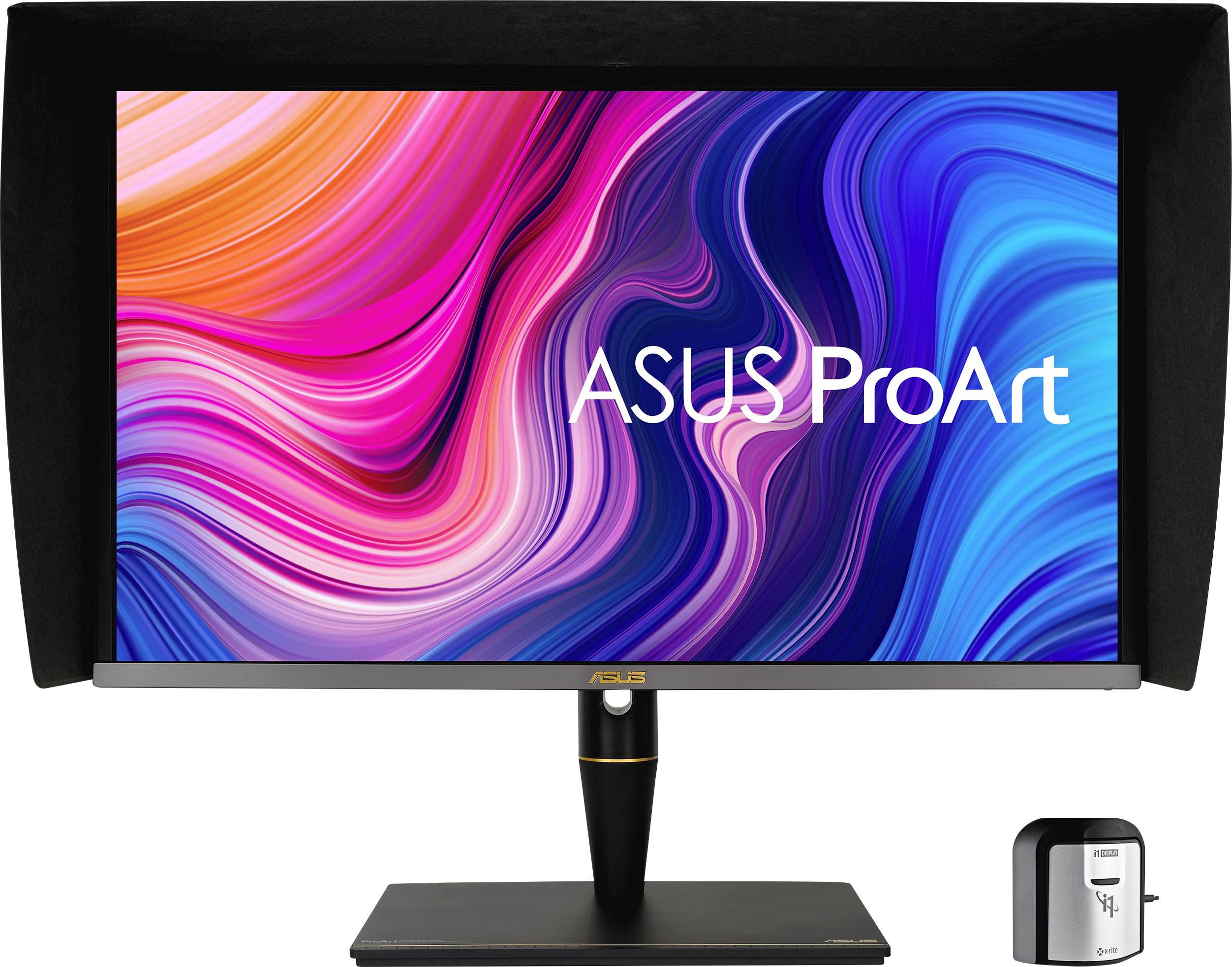 Un moniteur ASUS ProArt affiche un design abstrait aux couleurs vives. À côté se trouve un appareil de calibration.