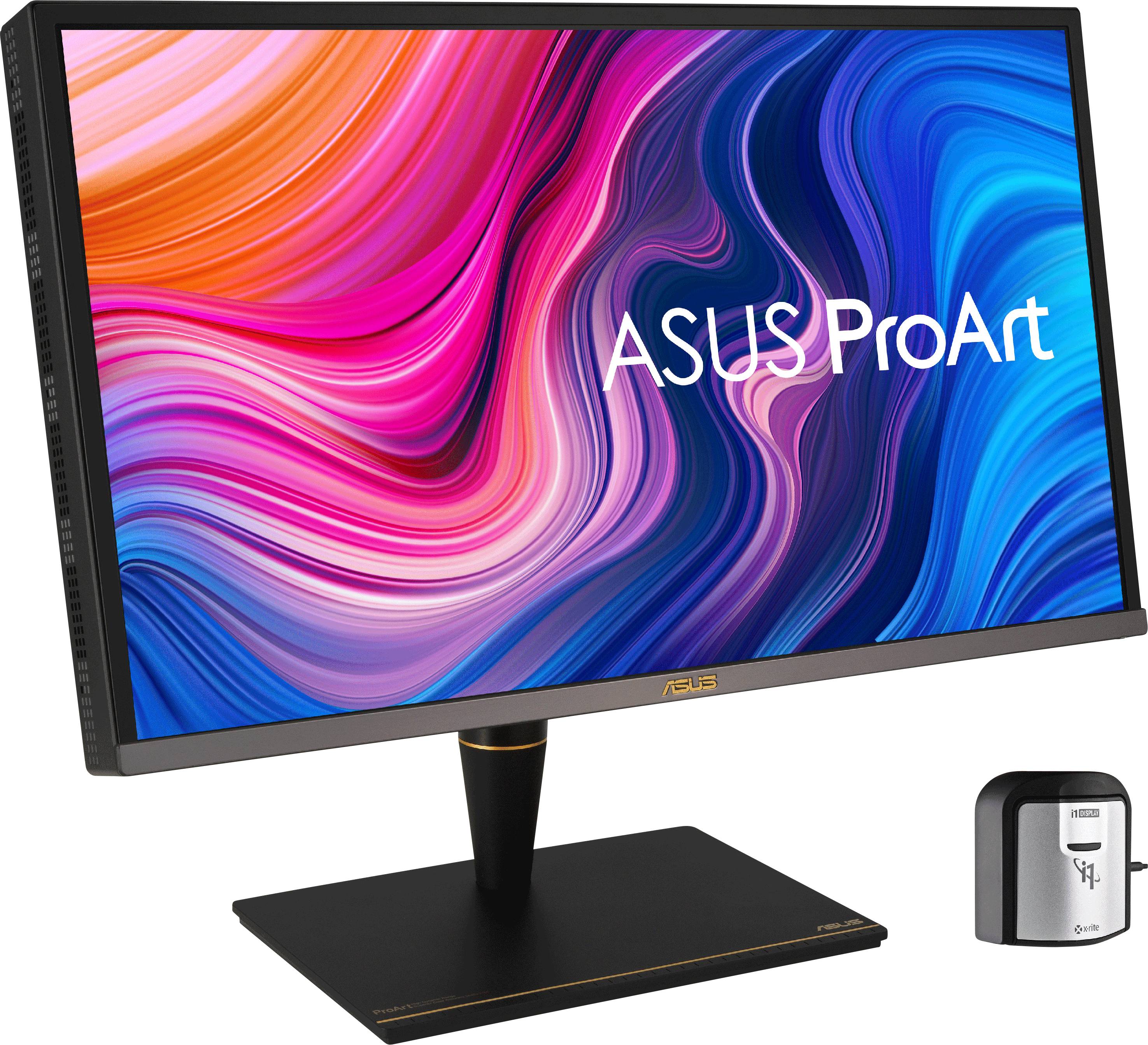 Un moniteur ASUS ProArt avec un écran couleur montrant des vagues vibrantes en rose, bleu et orange. Un périphérique de calibrage est posé à côté.