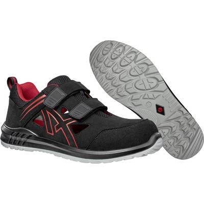 Chaussure de sport noire avec des détails rouges et une fermeture velcro, présentée de côté et par en-dessous. Semelle grise avec un profil antidérapant.
