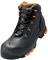 Bottes de sécurité noires avec des touches orange, design robuste et laçage, adaptées aux applications industrielles et à la protection du travail.