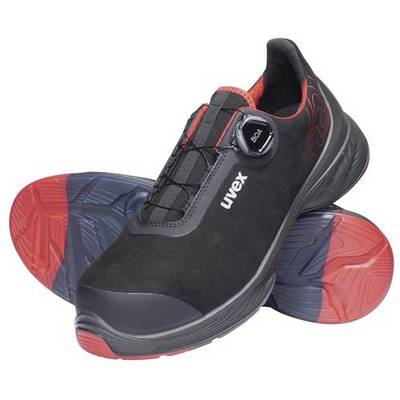 Chaussure de sécurité noire avec semelle rouge et système de fermeture BOA, logo de marque 'uvex' sur le côté. Chaussure conçue pour des applications industrielles.