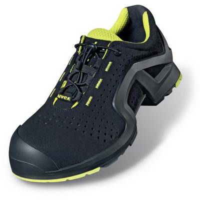 Chaussure de travail noire avec des touches jaunes, dotée d'un bout renforcé et d'un matériau supérieur perforé pour une meilleure respirabilité.
