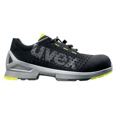Chaussure de sécurité noire avec un design perforé et des détails jaunes marquants sur la semelle. Le nom de marque 'Uvex' est visible sur le côté.