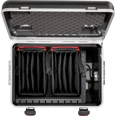 Un sac de rangement ouvert avec compartiments et ports USB, adapté pour le stockage sécurisé des appareils électroniques.