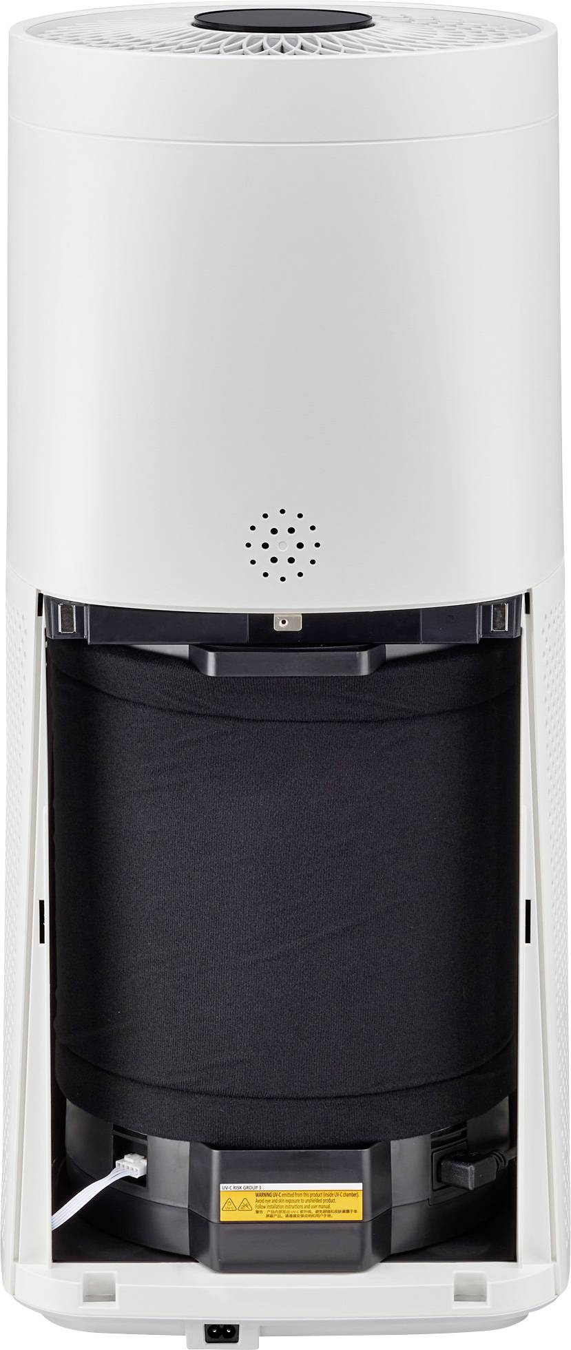 Purificateur d'air avec boîtier ouvert, montrant le filtre intérieur. Grille de ventilateur supérieure visible pour la circulation de l'air.