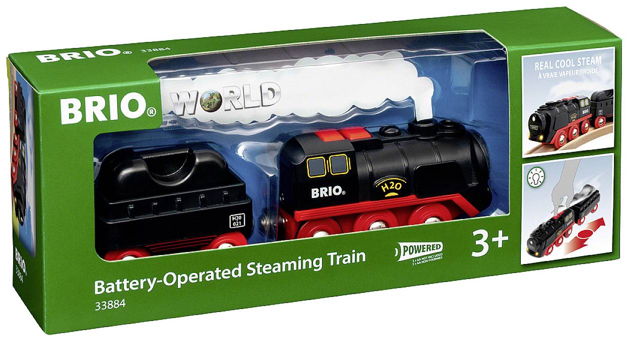 Locomotive à vapeur jouet électrique dans un emballage vert. Convient aux enfants à partir de 3 ans. L'image de la locomotive montre un effet de "vrai" vapeur.