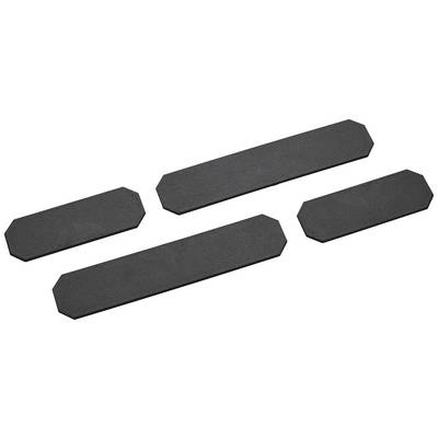 Quatre bandes adhésives noires, rectangulaires, aux coins biseautés, posées sur une surface blanche.