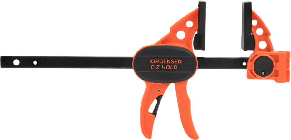 Un étau de serrage orange de la marque Jorgensen E-Z Hold avec une poignée et des mâchoires noires, adapté pour fixer solidement des pièces de travail.