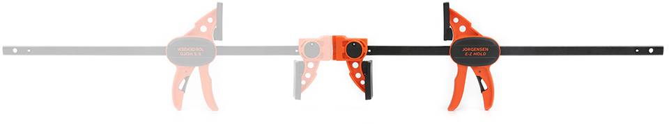 Écarteur extensible Jorgensen E-Z Hold en rouge et noir. Pinces ajustables pour travaux sur bois, composées de deux serre-joints montés sur un rail.