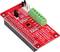 Carte électronique verte avec circuit imprimé et étiquette '4 CH ADC 16 bits avec PGA pour RPi'. Elle présente plusieurs broches et des bornes de connexion vertes.