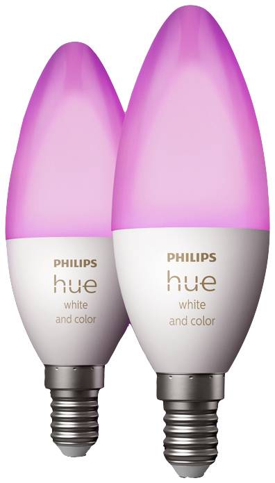 Deux ampoules LED Philips Hue en forme de bougie, capables de s'illuminer dans différentes couleurs. Elles sont idéales pour un éclairage décoratif.