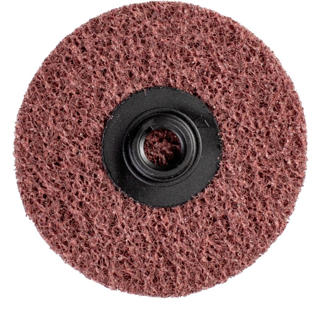 Disque abrasif brun à surface rugueuse et centre en plastique noir, adapté pour les travaux de polissage et de meulage.