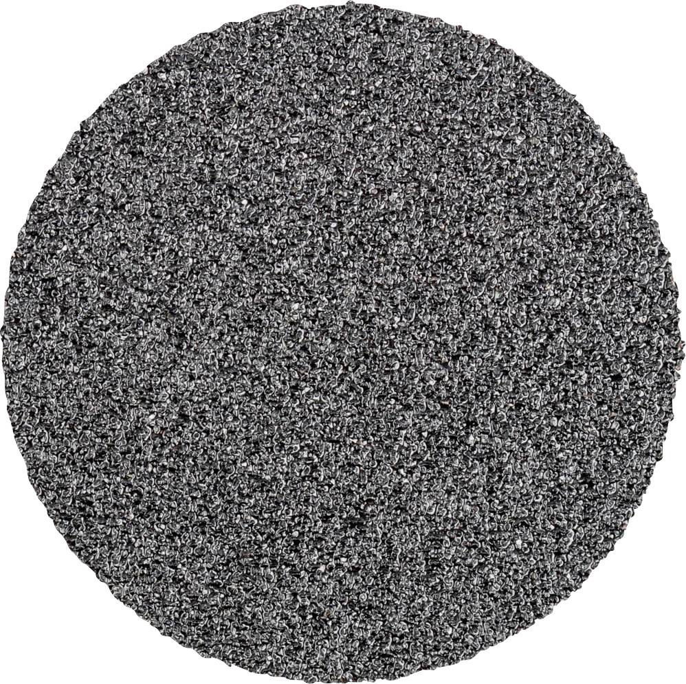 Un disque de papier de verre à grain grossier, principalement de couleur gris foncé.