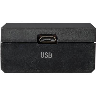 Un adaptateur noir avec un port USB à l'avant, l'emplacement où une clé USB peut être branchée, est clairement visible.