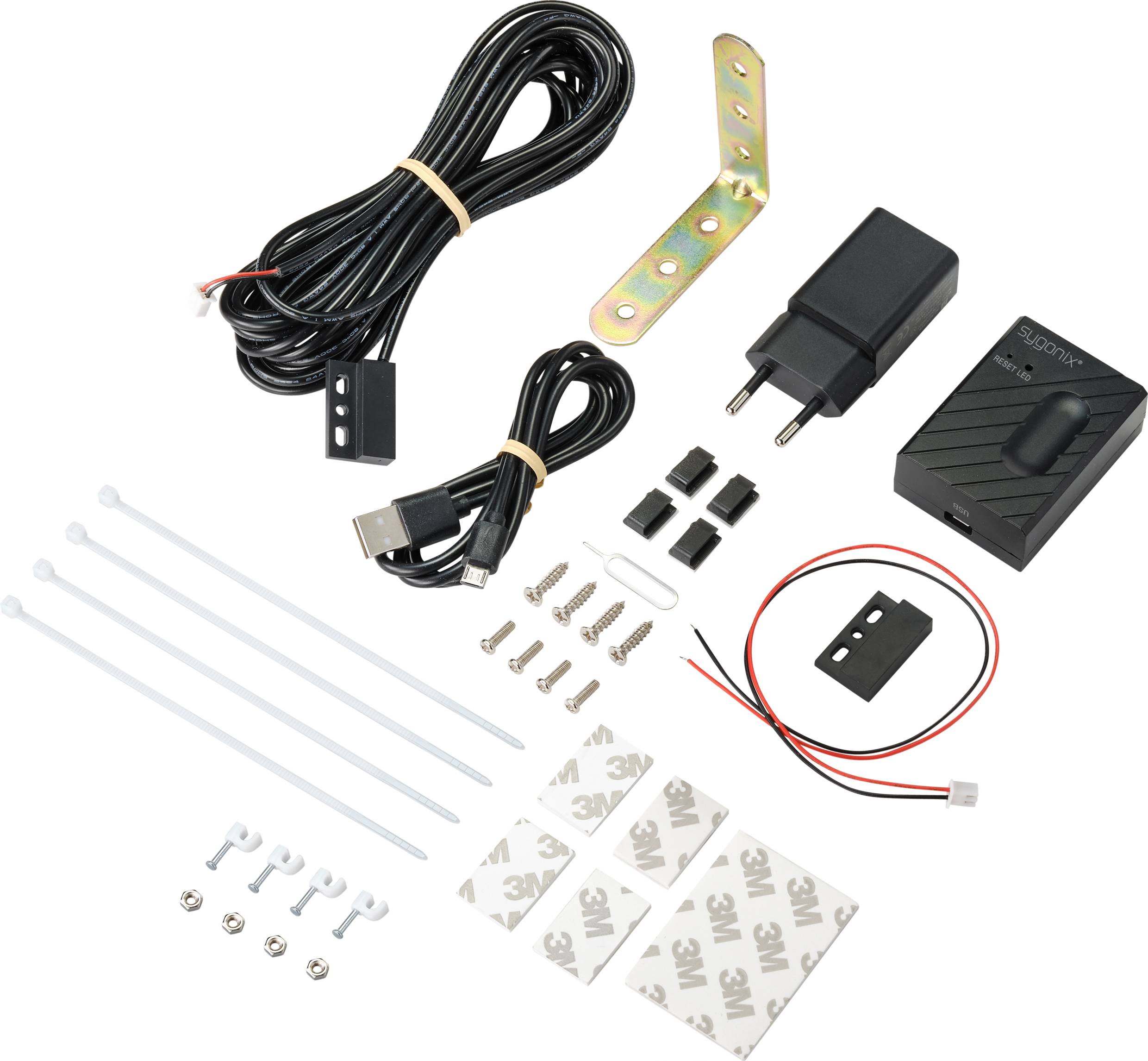 Ensemble d'accessoires électroniques comprenant des câbles, des fiches, du matériel de fixation et un manuel de montage.