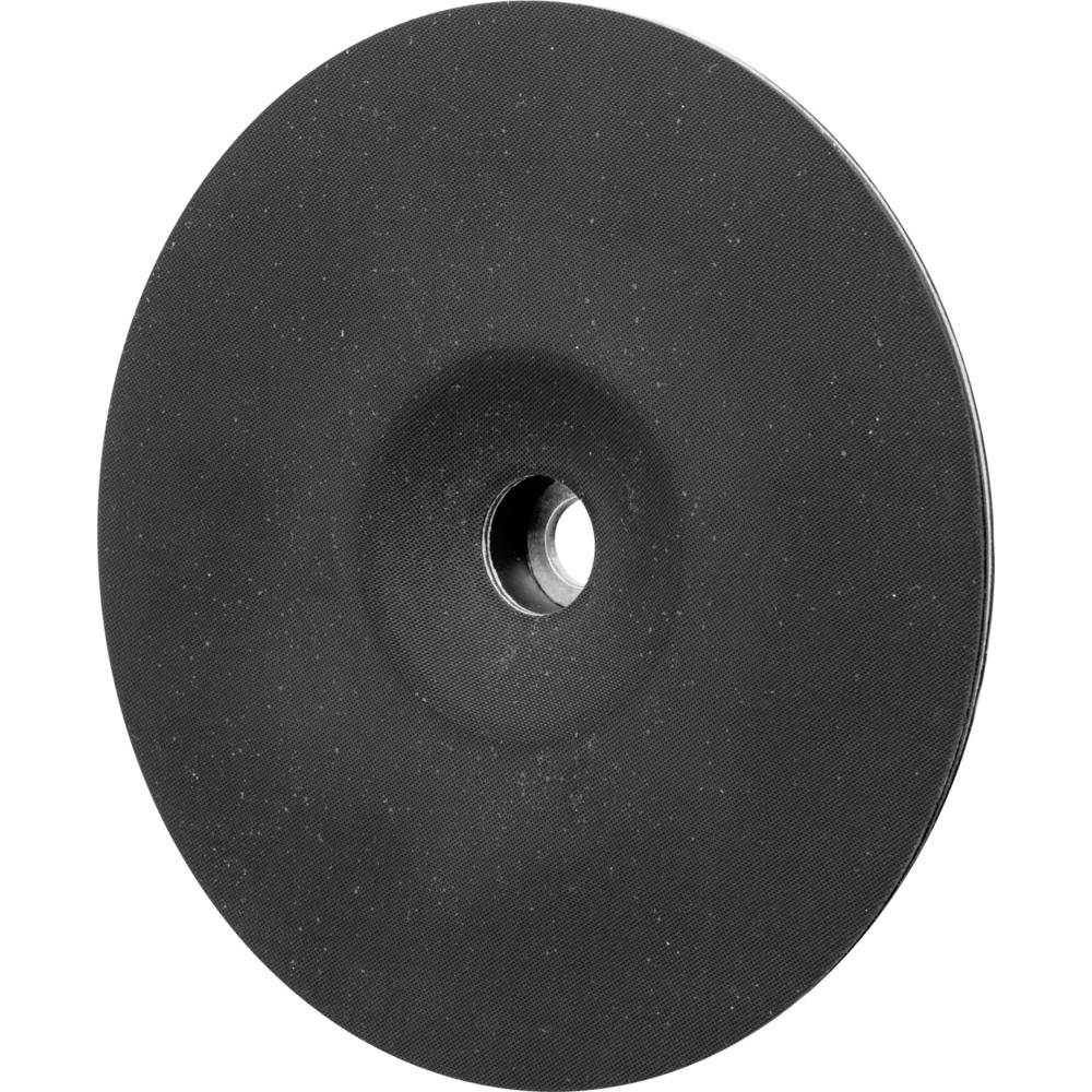 Un disque noir avec un trou central, ressemblant à un CD ou à un corps de meule, sur un fond blanc.