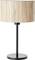 Une lampe de table avec un pied en métal noir et un abat-jour cylindrique en tissu beige rayé.