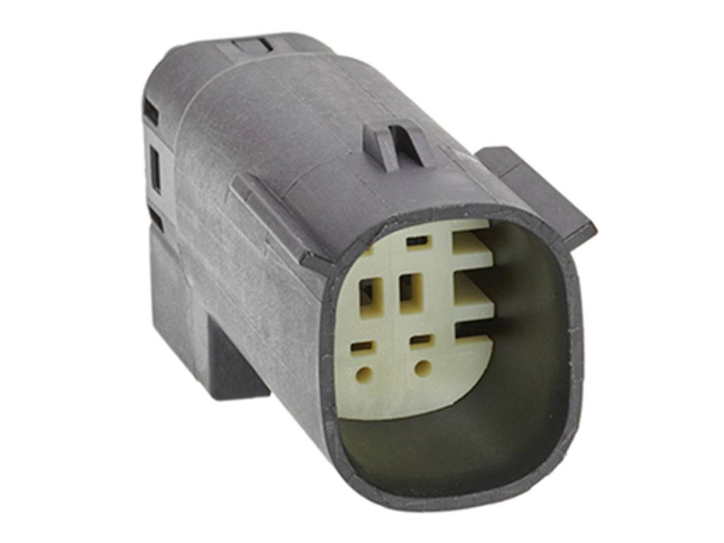 Un connecteur rectangulaire noir en plastique avec plusieurs broches internes, vue de côté.