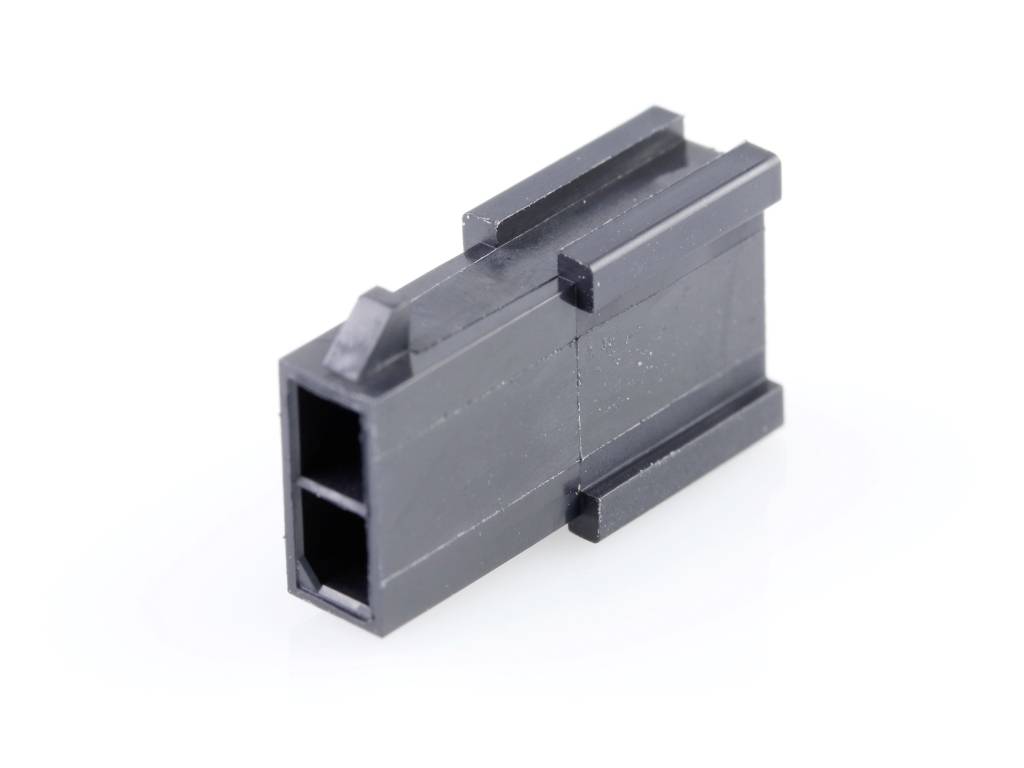 Un connecteur noir en plastique de forme rectangulaire avec deux chambres, utilisé pour les connexions électriques et le câblage.