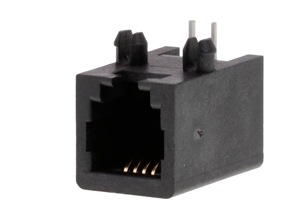 Une prise RJ45 noire, utilisée pour les connexions Ethernet, avec huit contacts en cuivre à l'intérieur, sur un fond blanc.