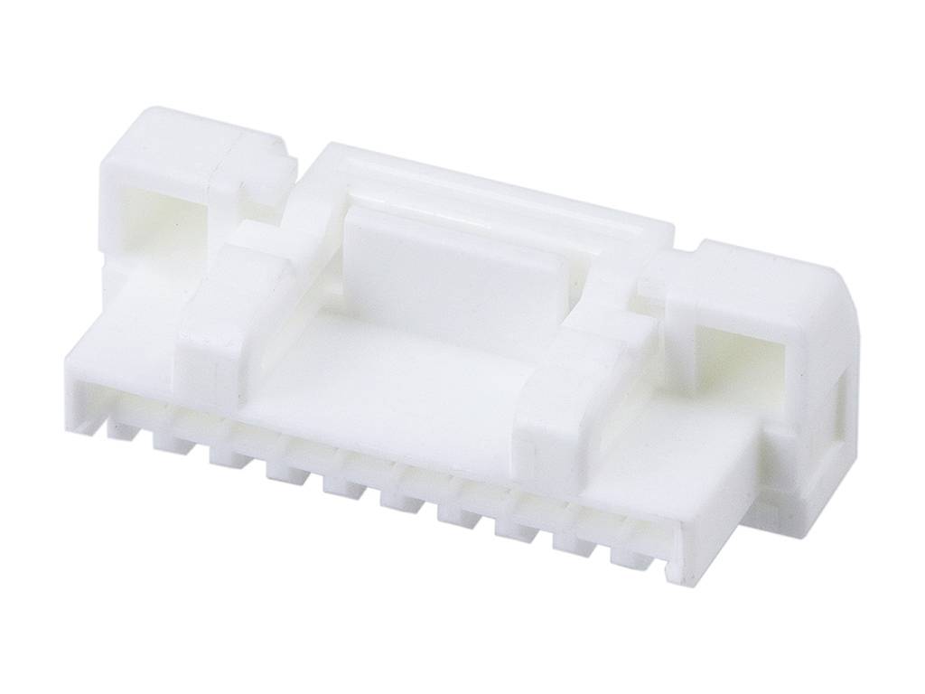 Un connecteur en plastique blanc avec plusieurs ouvertures de raccordement, adapté pour les connexions électroniques.