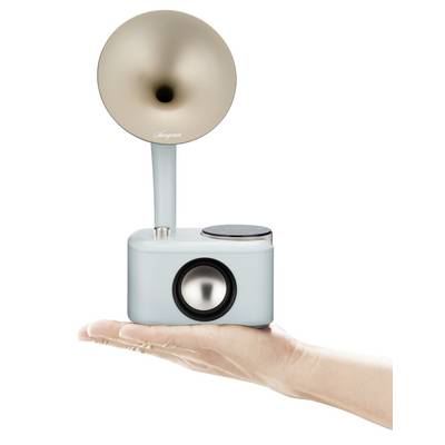 Petit haut-parleur rétro à pavillon, tenu dans une main. Design élégant et minimaliste, parfait pour une décoration tendance.