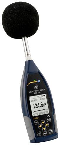 Un sonomètre avec affichage numérique indique '124,6 dB'. Il mesure le niveau sonore en décibels.