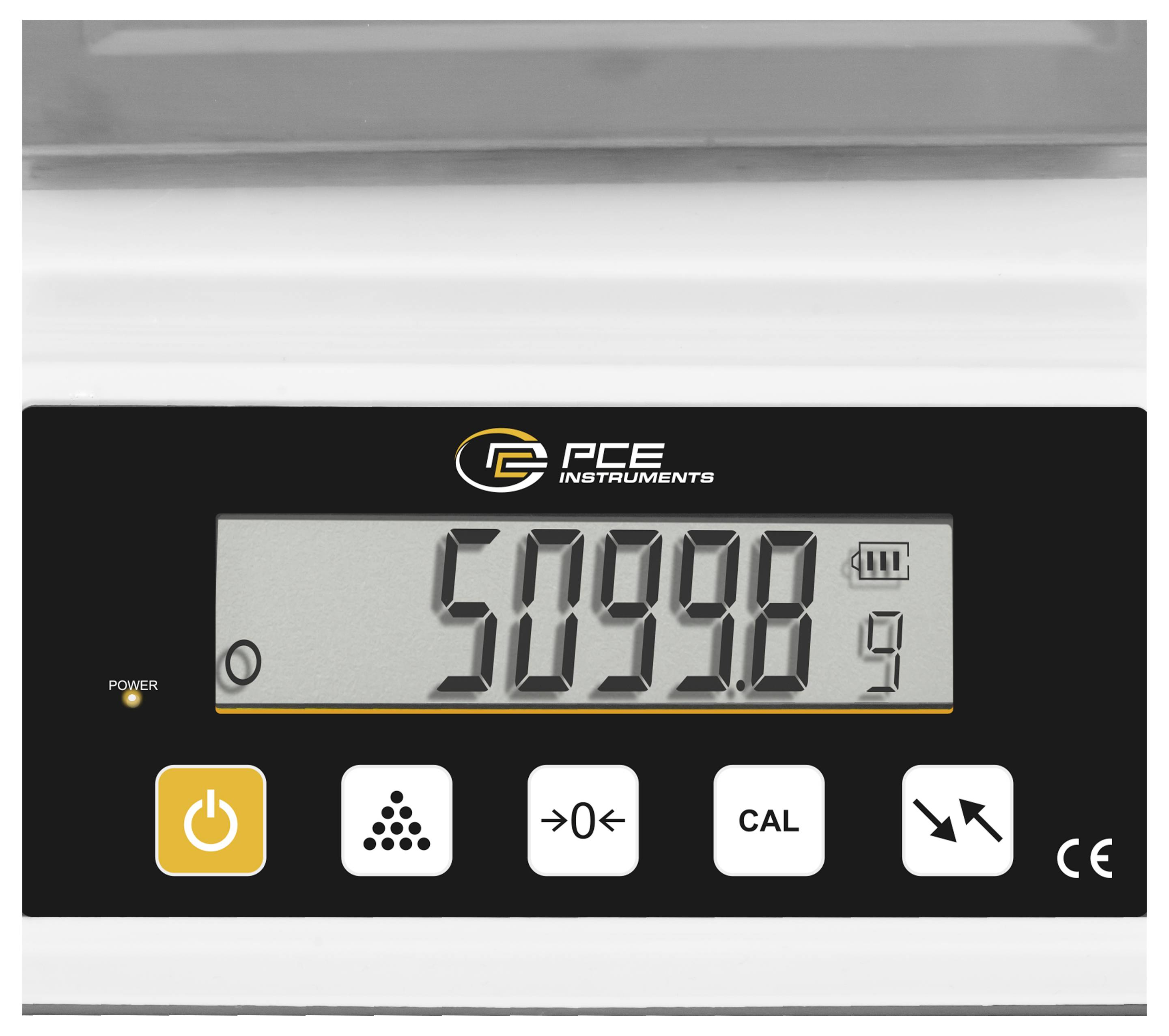 Affichage du compteur des instruments PCE numérique montrant 5099.8 avec icône de batterie et boutons de contrôle ci-dessous.