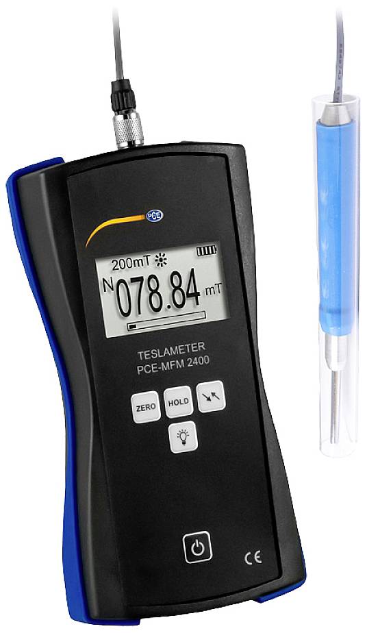 Un magnétomètre portable mesure un champ magnétique de 78,84 mT. L'affichage montre l'unité de mesure et les touches de fonction Zéro, Maintenir et Arrêt.