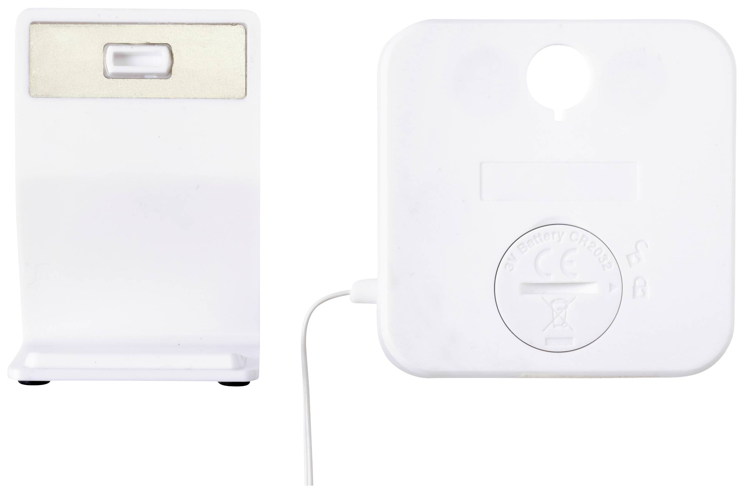 Deux appareils blancs : À gauche, un support, à droite un appareil carré avec une connexion pour câble et un couvercle de batterie.