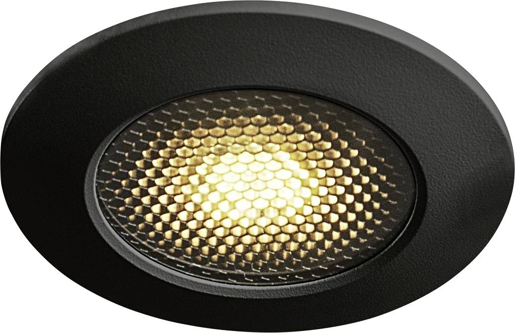 Spot encastrable noir avec grille de protection en nid d'abeille et éclairage LED chaleureux au centre.