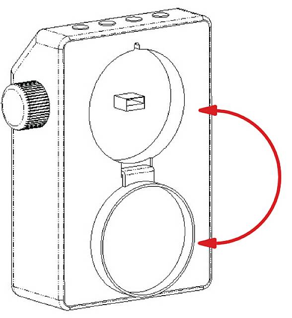 Un appareil avec des ouvertures circulaires, mis en évidence par une flèche rouge. Un bouton rotatif à gauche.