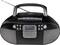 Une radio portable noire avec antenne, haut-parleurs, touches et écran affichant « Absolut relax Pop Musique ».