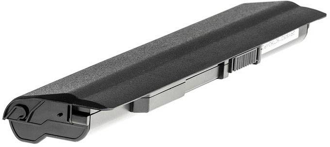 Batterie pour un ordinateur portable, forme rectangulaire noire, avec plusieurs points de connexion visibles sur sa face inférieure.