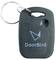 Porte-clés avec le logo DoorBird, boîtier noir, anneau porte-clés argenté, coins arrondis, poignée incisée en haut.