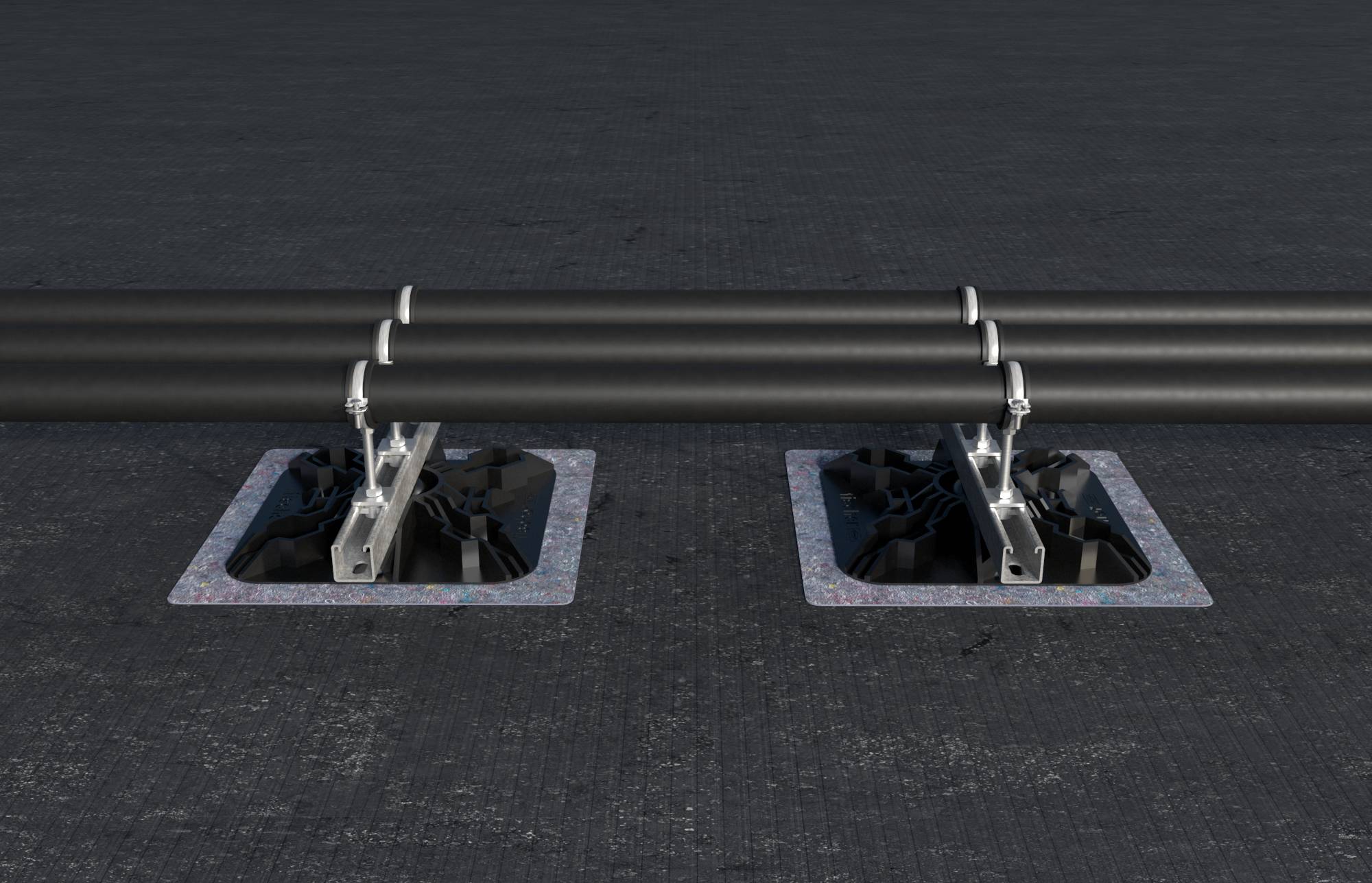Des tuyaux noirs sont montés parallèlement sur deux supports métalliques et fixés sur des plateformes carrées reposant sur une surface sombre.
