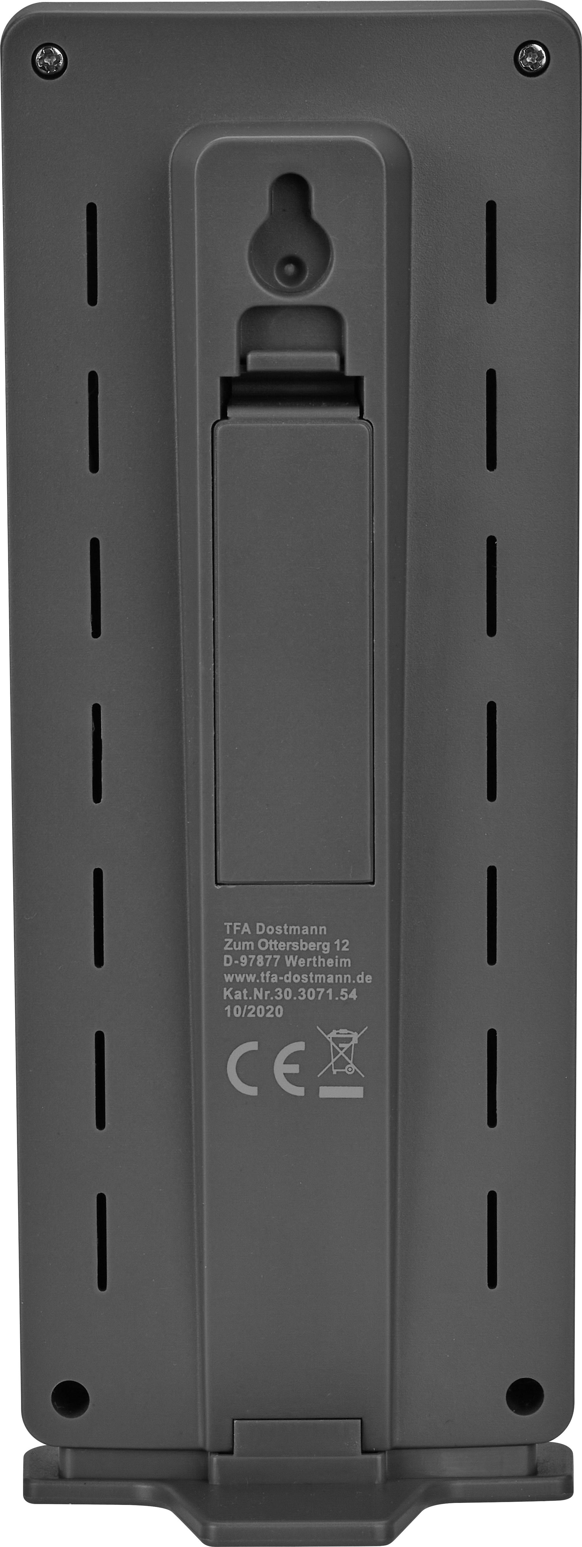 Arrière d'un appareil électronique gris avec des fentes de ventilation et le marquage CE.