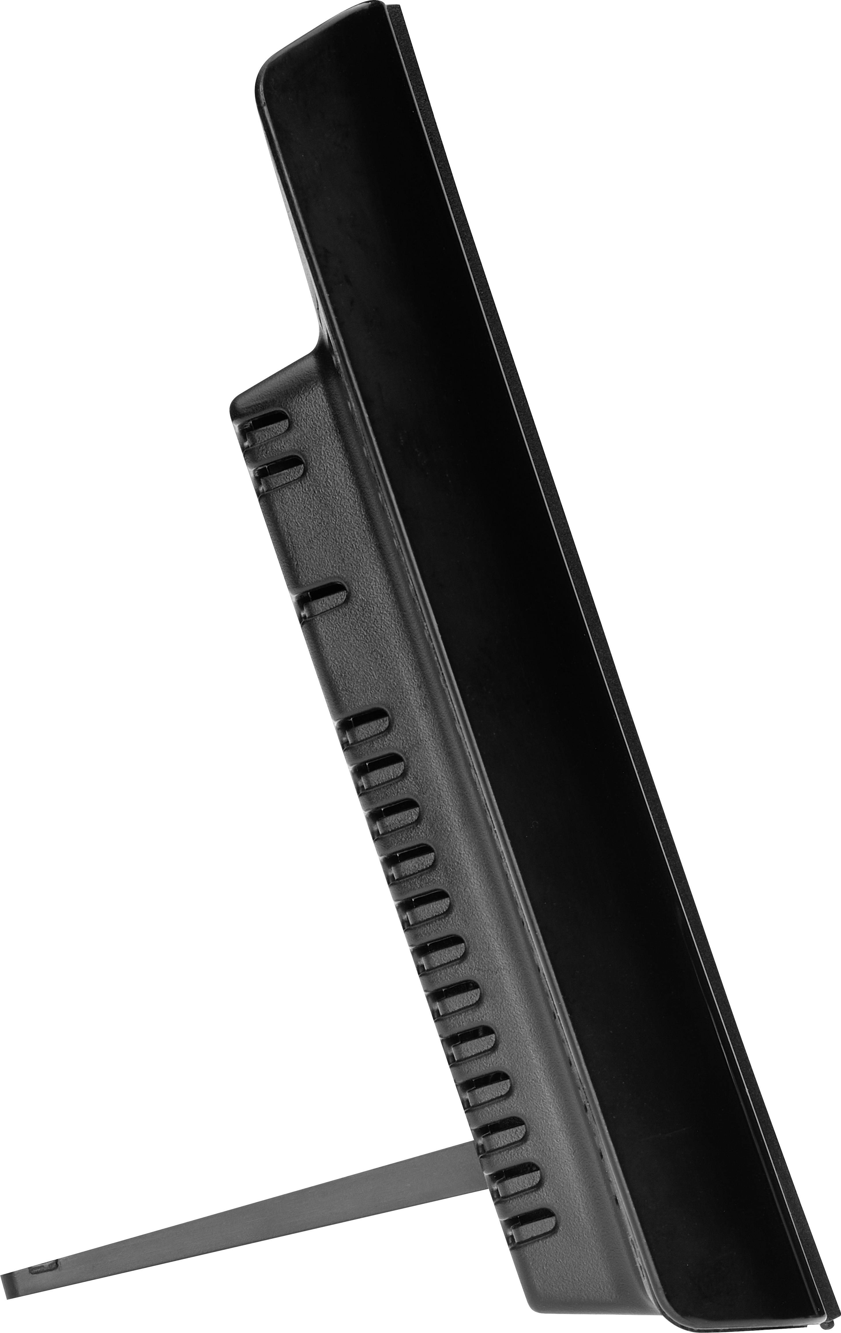 Vue latérale d'un appareil noir rectangulaire avec un pied de support, probablement un moniteur ou un écran.