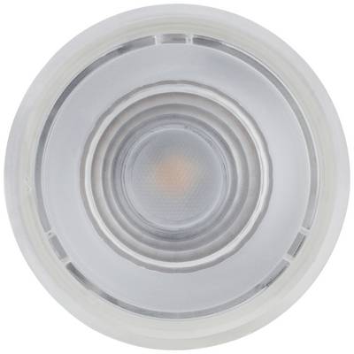 Un objet rond avec des anneaux concentriques au centre, disposés dans un motif qui rappelle une lentille.