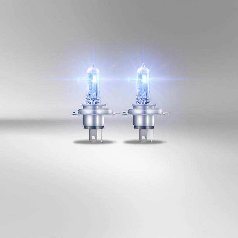 Deux lampes halogènes modernes avec un éclat lumineux bleuâtre sur un fond gris. Adaptées pour les éclairages automobiles.