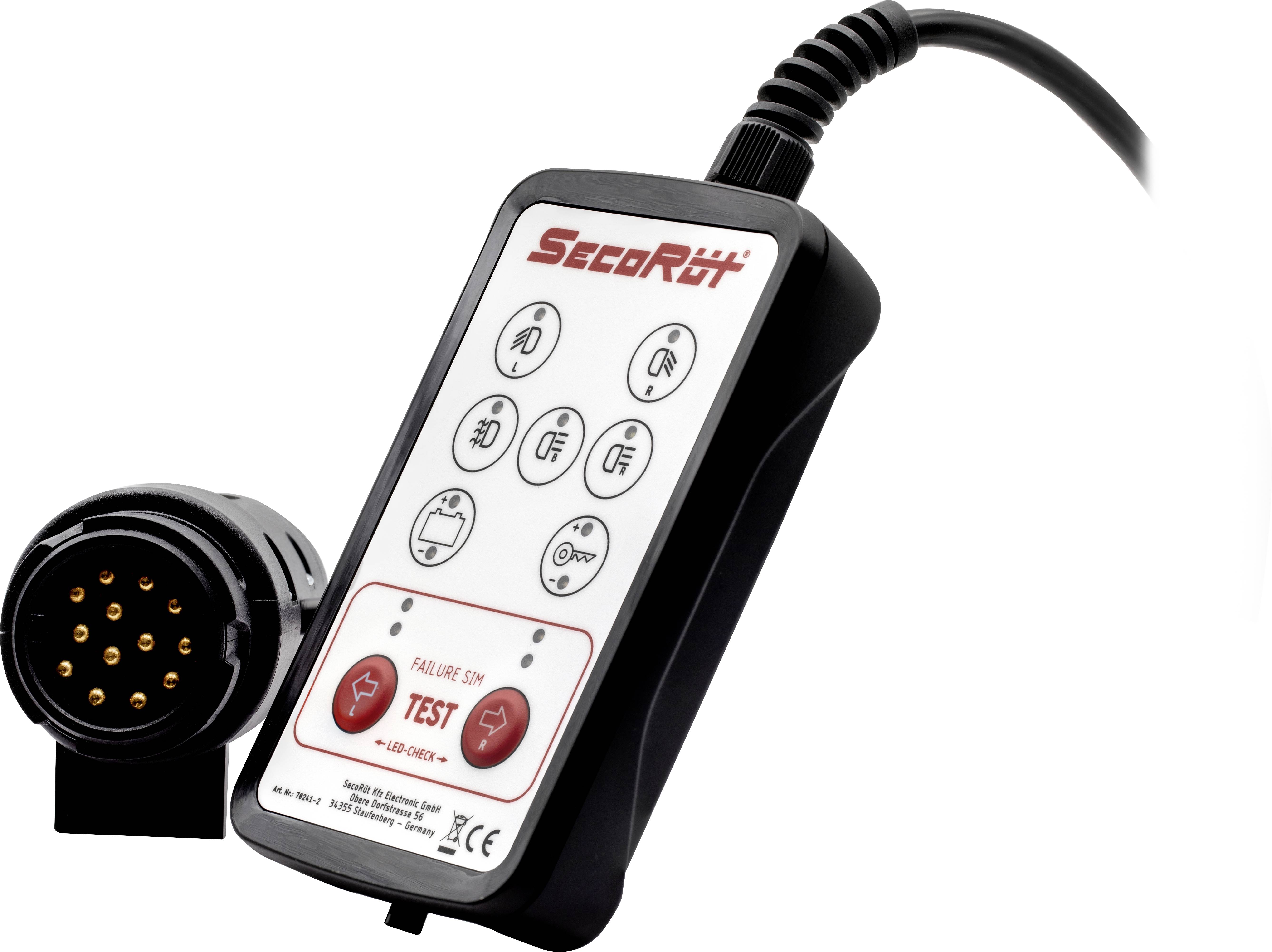 Un petit dispositif de test portable avec plusieurs touches pour vérifier les connexions de remorque. Impression : 'Secorüt' et 'TEST'.
