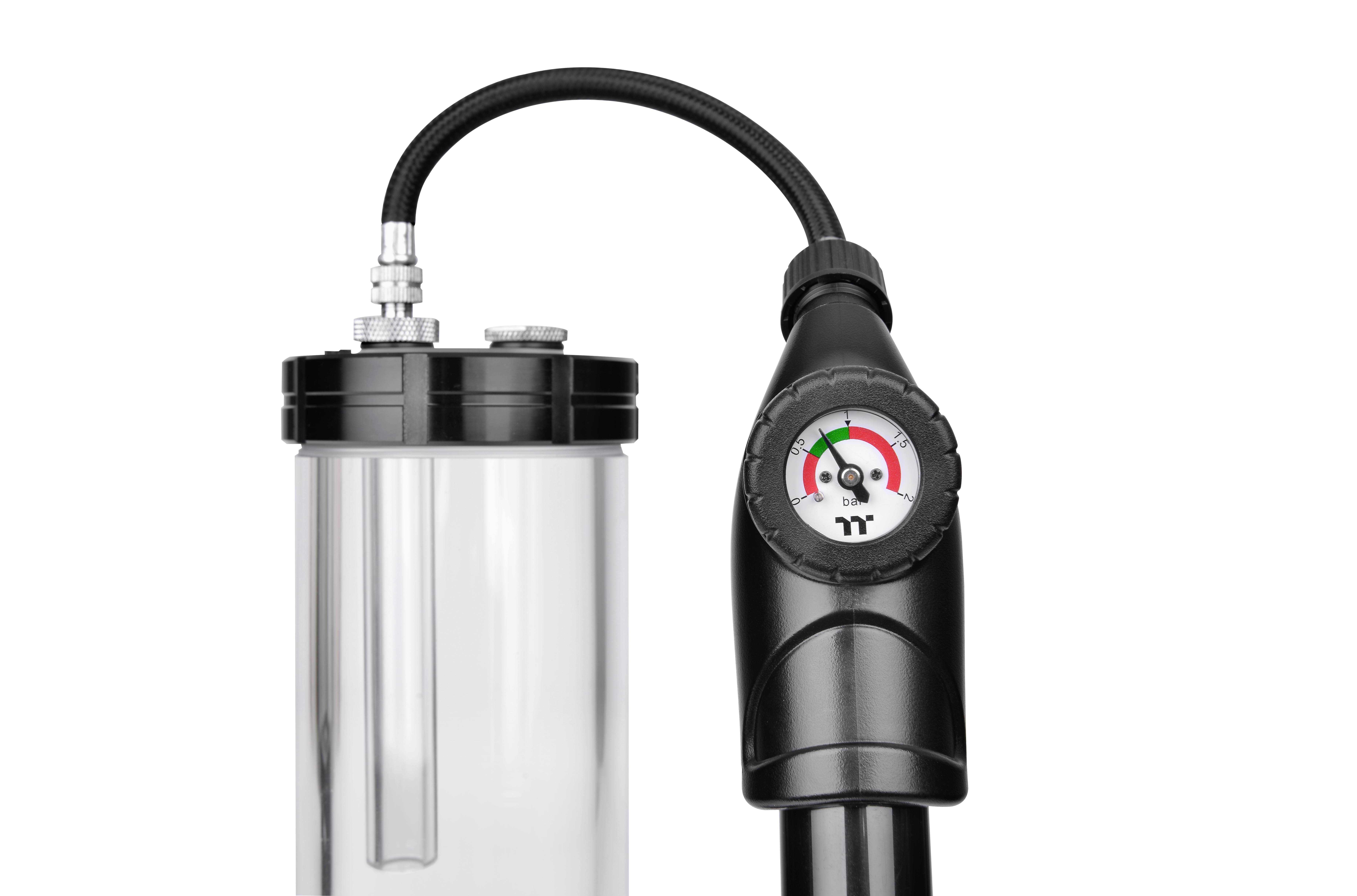 Récipient transparent pour l'eau avec un couvercle noir et un manomètre connecté. L'affichage indique un secteur vert.