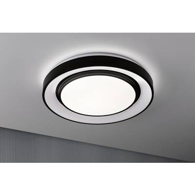 Plafonnier rond au design moderne, diffusant une lumière uniforme. Il est installé sur un plafond peint en blanc.