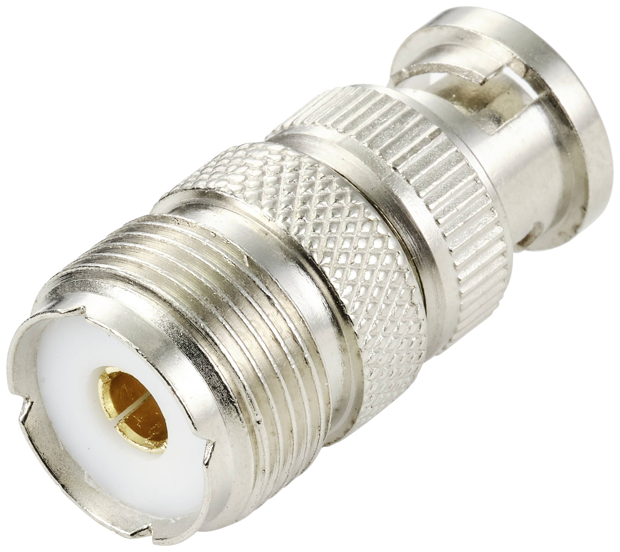 Un adaptateur coaxial argenté reliant une fiche N à un connecteur BNC, sur un fond blanc.