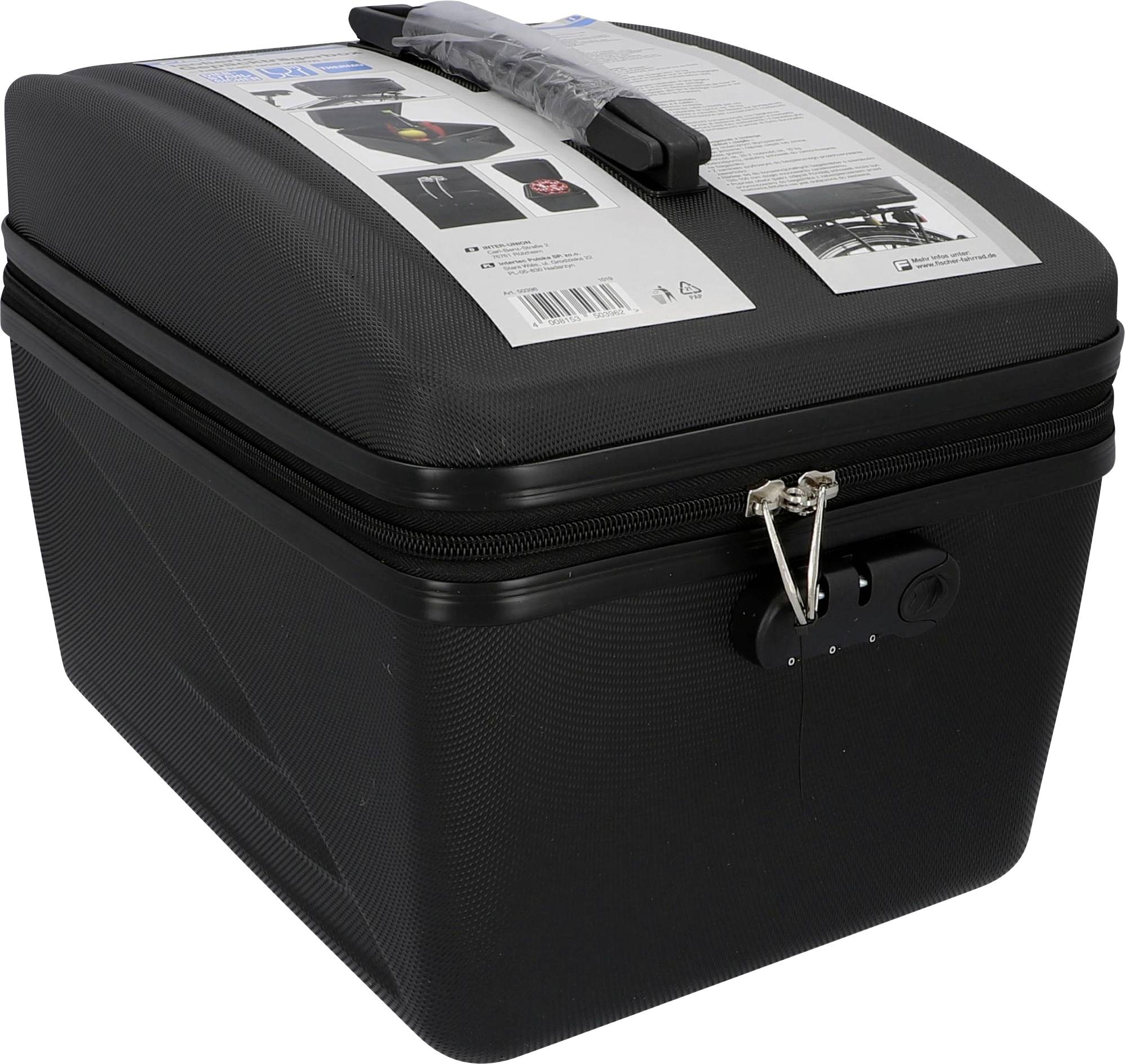 Boîte noire verrouillable avec une pince métallique et une poignée. Le couvercle comprend des pochettes transparentes contenant des instructions et un stylo noir.