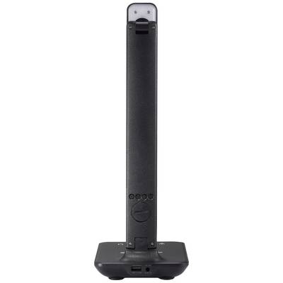 Un appareil électronique noir en forme de barre, doté de touches et de ports à sa base, se tenant debout sur une base plate et carrée.