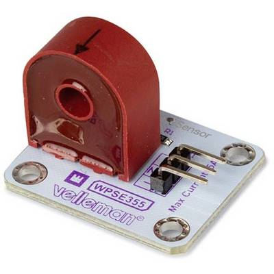 Capteur électronique de courant avec noyau de ferrite rouge et logo Velleman. Développé pour mesurer et surveiller les courants électriques.
