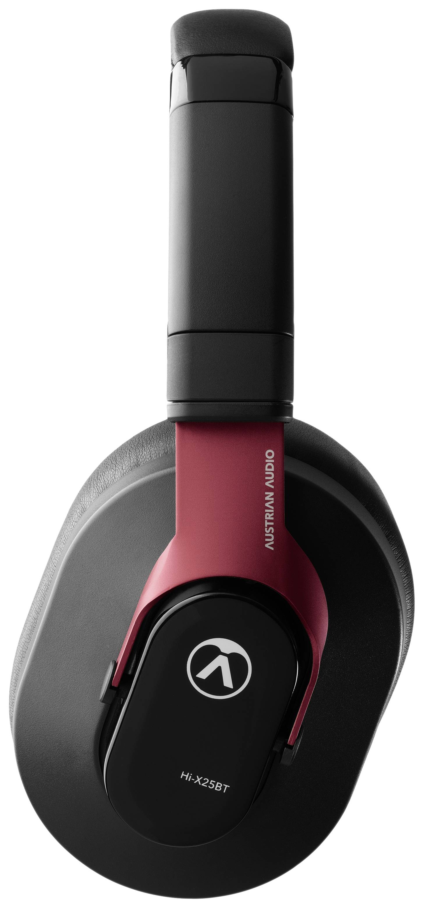 Casque audio over-ear noir et rouge avec logo sur le pavillon. Design moderne et élégant.