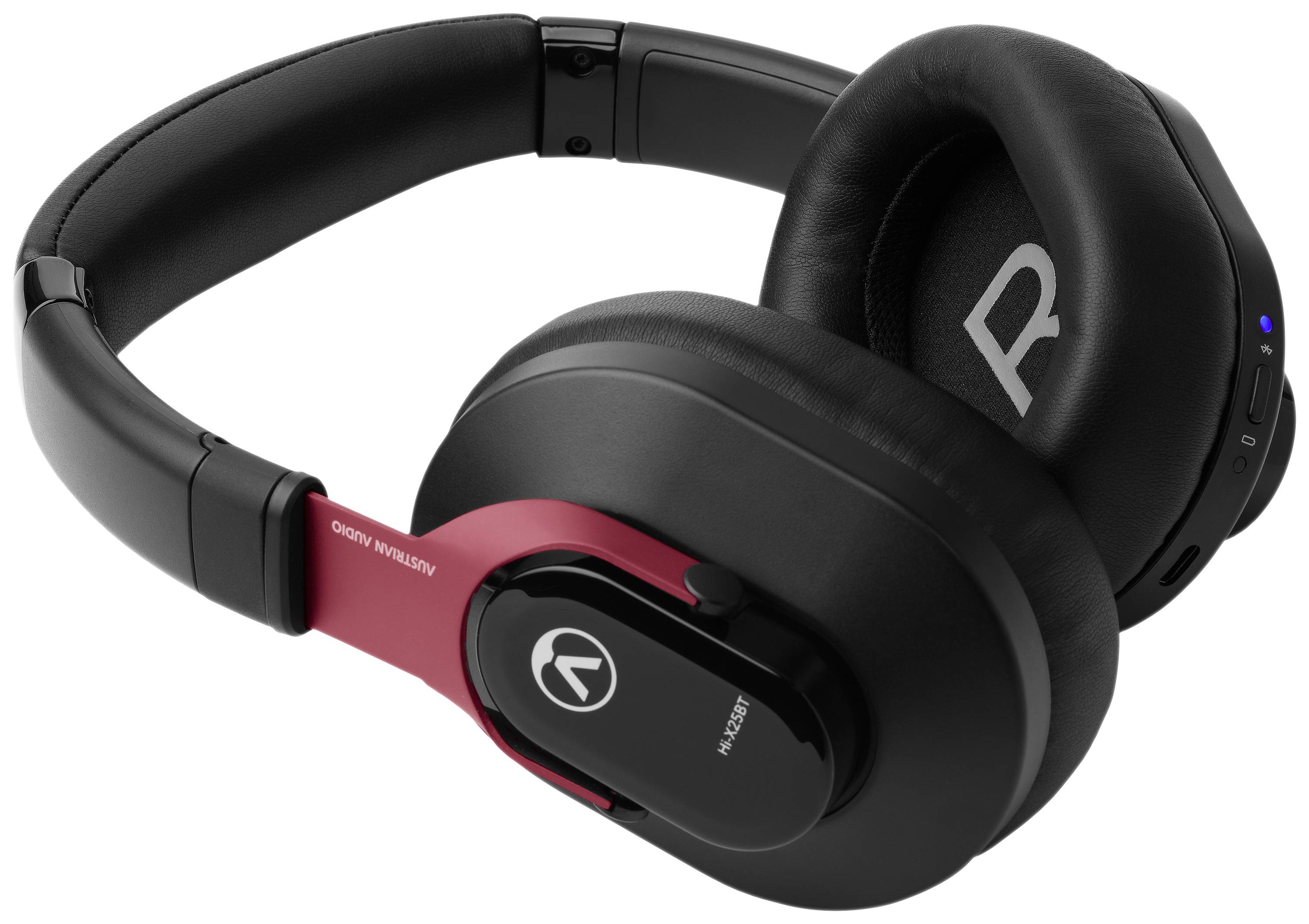 Casque audio noir circum-auriculaire avec un accent rouge et le symbole de la marque sur le côté, représentant un style moderne et une fonctionnalité élégante.